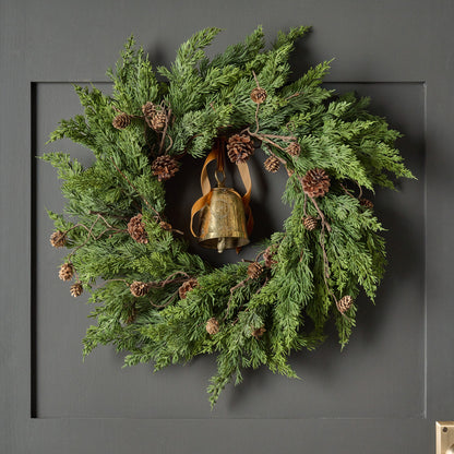 Real Touch Maeve Pine Wreath shown hung on door with bell