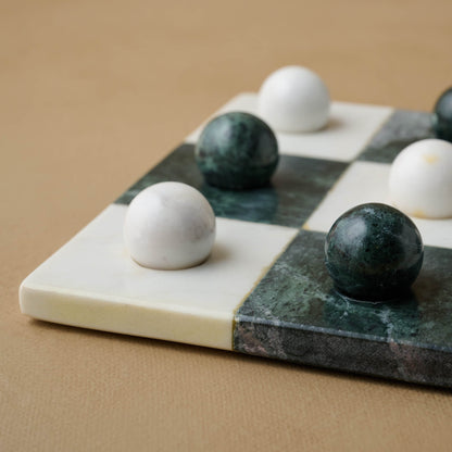 Green and White Marble Tic Tac Toe close up of marble balls on top