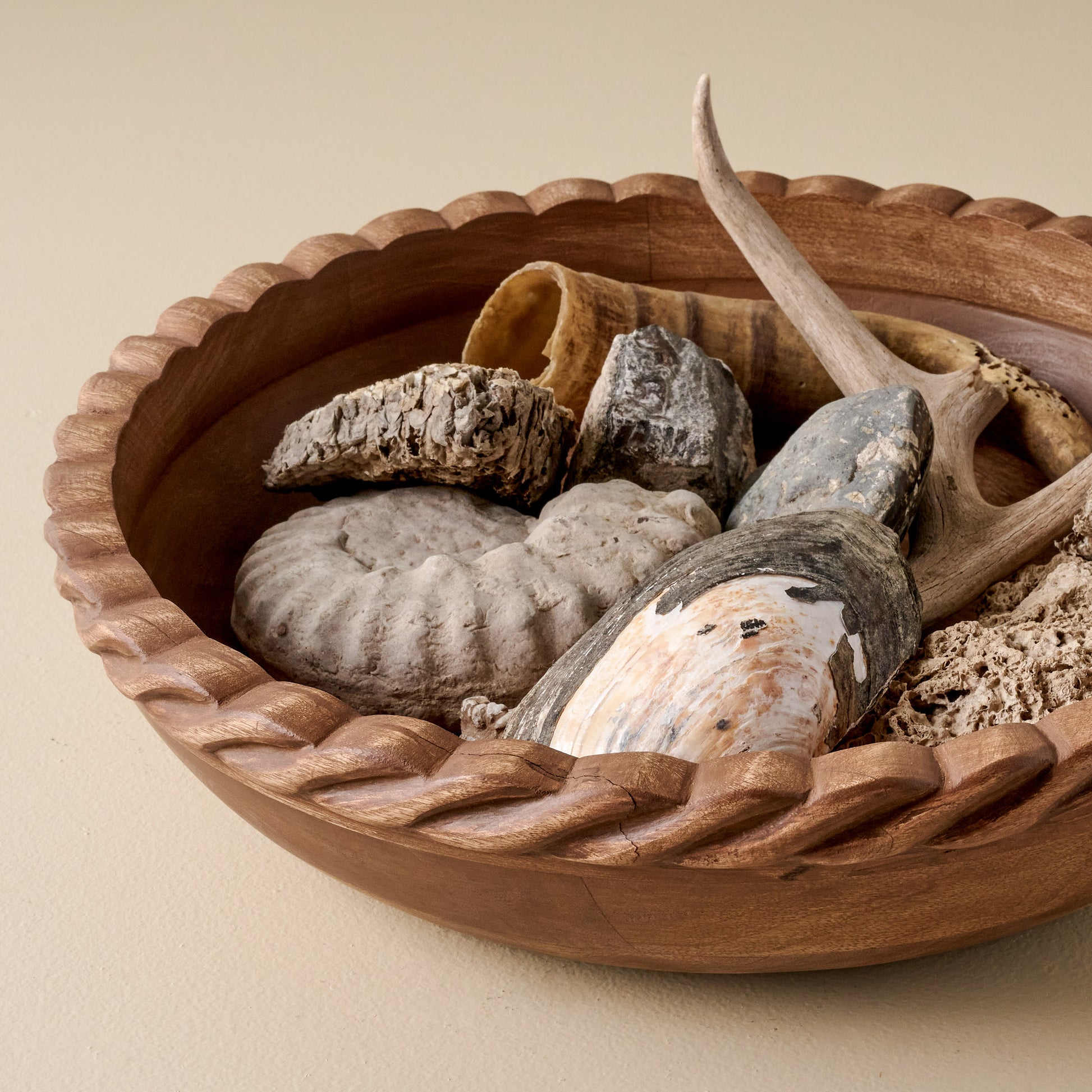 Oversized Antiqued Wood Twisted Bowl shown filled with shells