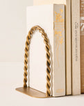 Twisted Vintage Inspired Bookends next to books