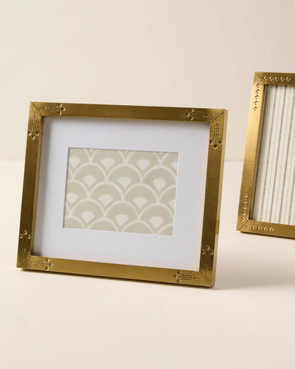 Floral Antique Brass Photo Frame shown sitting horizontally