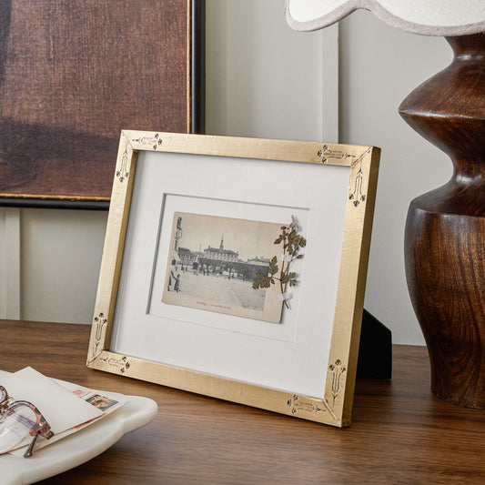 Floral Antique Brass Photo Frame shown on table