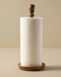 Antiqued Wood Paper Towel Holder with a roll of paper towel on it