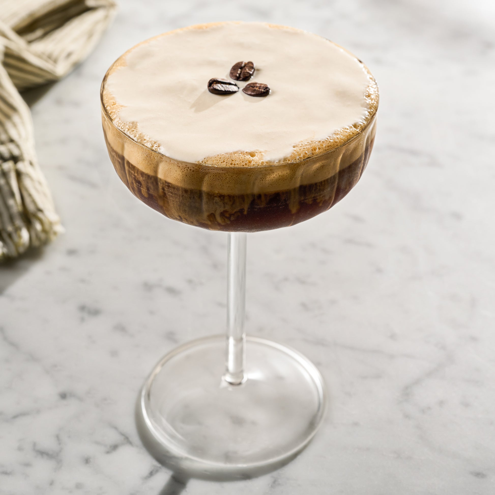 Fluted Coupe Glass with espresso martini