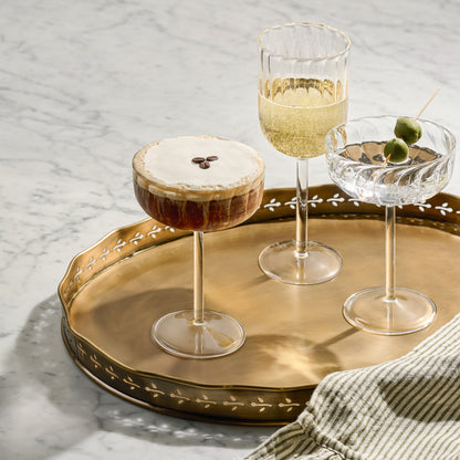 Fluted Wine Glass with wine with other drinks on platter