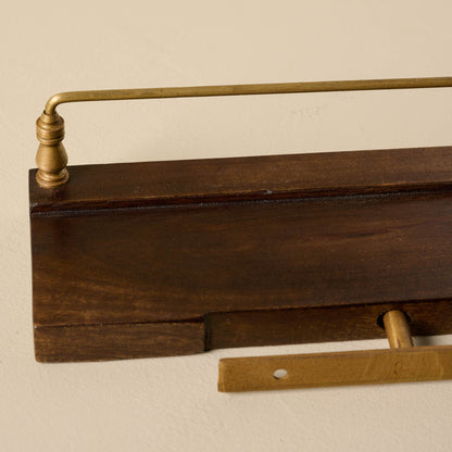 Elliott Wood and Brass Picture Ledge close up of wall hanging hardware