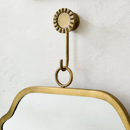 Justine Brass Hanging Mirror close up of hook holding mirror