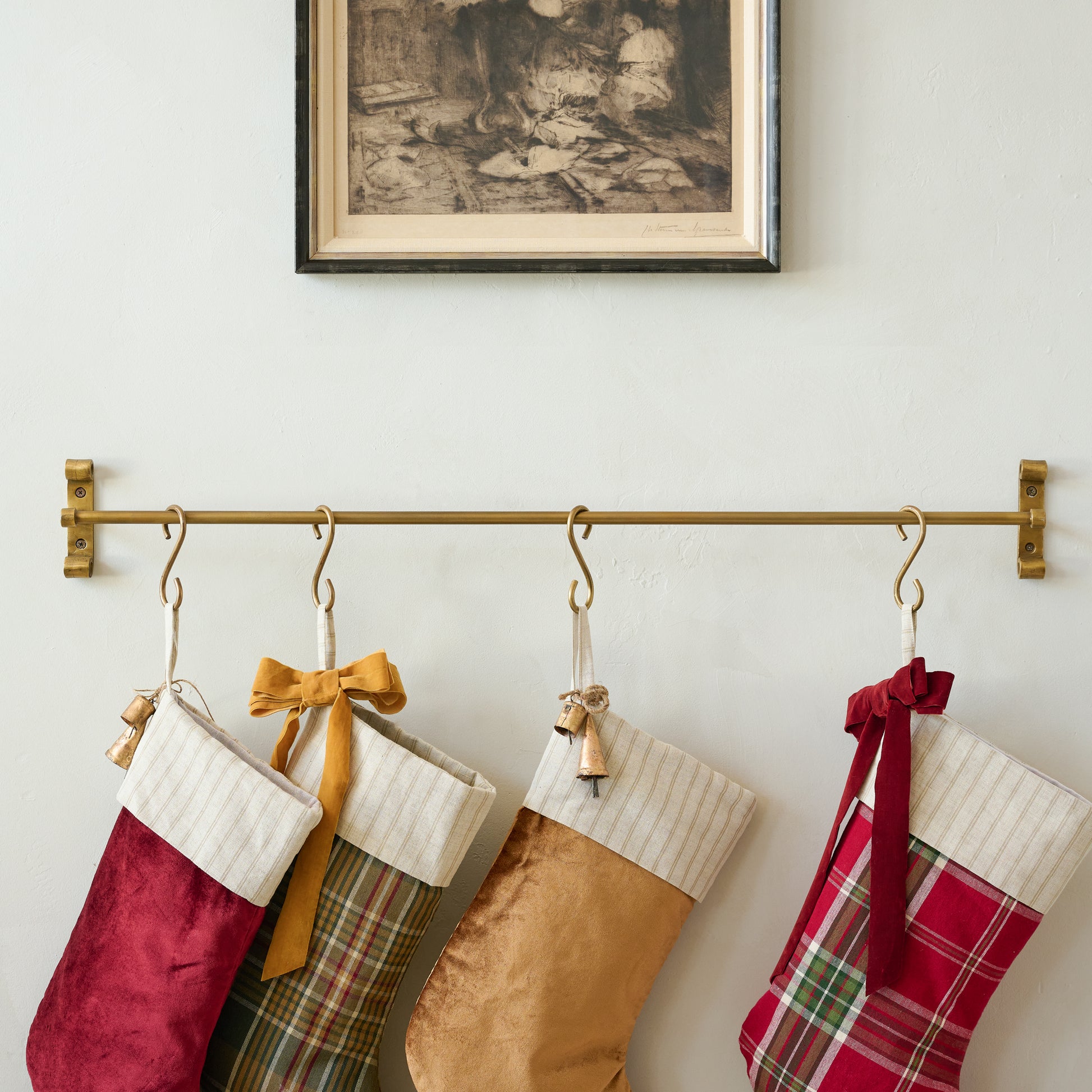 Duke Brass Rail with Hooks shown with stockings