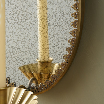 Oval Antique Mirrored Sconce close up of mirror 