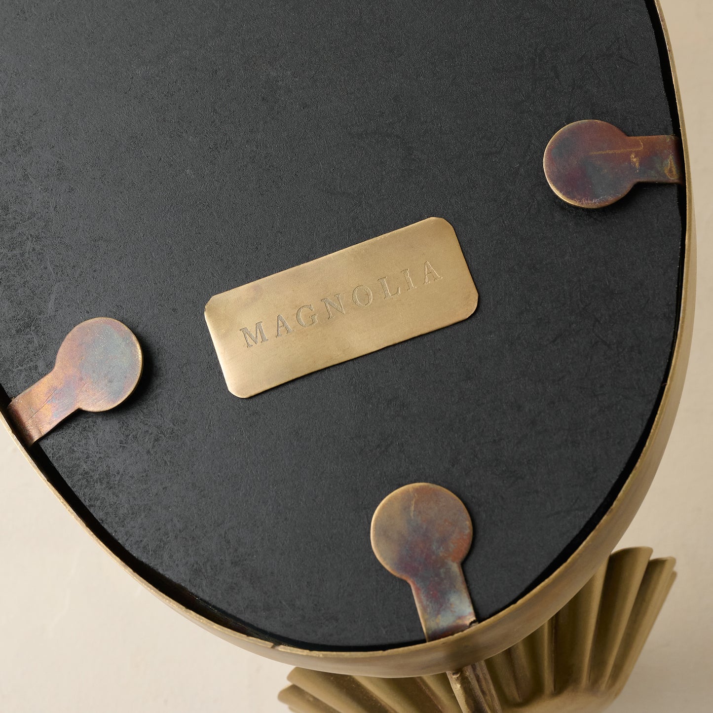 Oval Antique Mirrored Sconce magnolia logo on the back of mirror