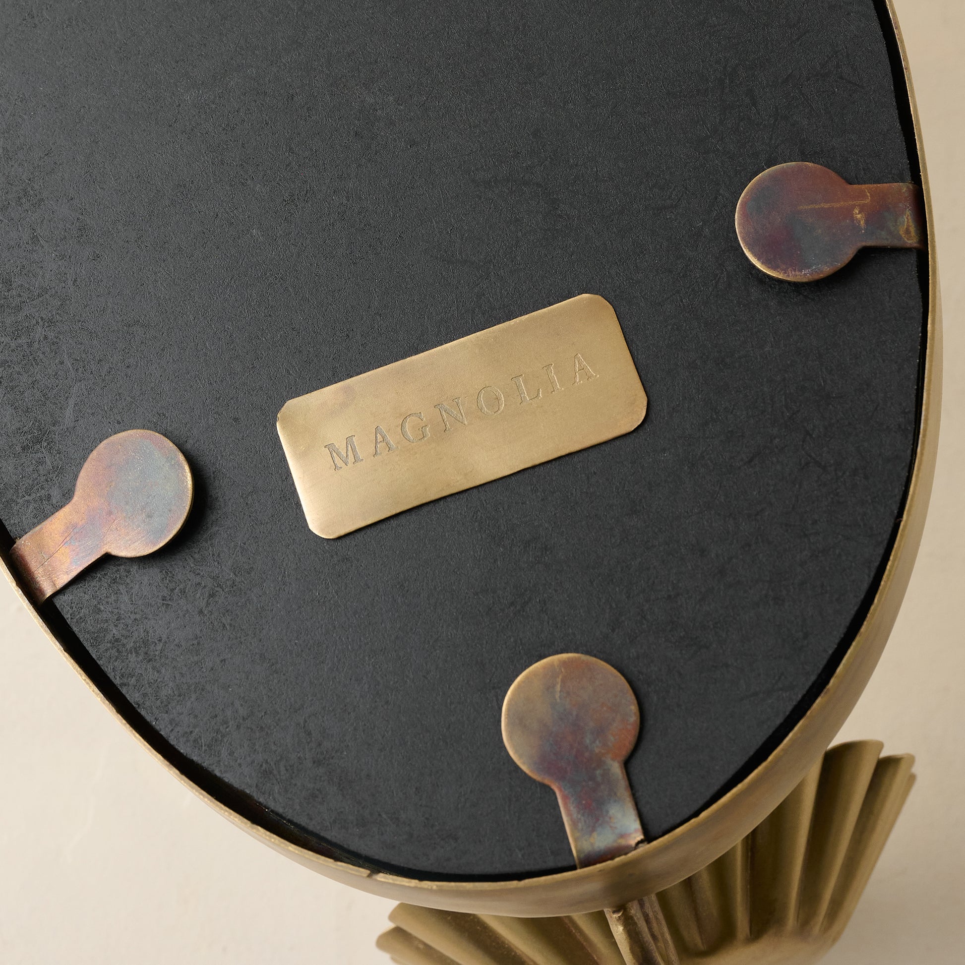 Oval Antique Mirrored Sconce magnolia logo on the back of mirror