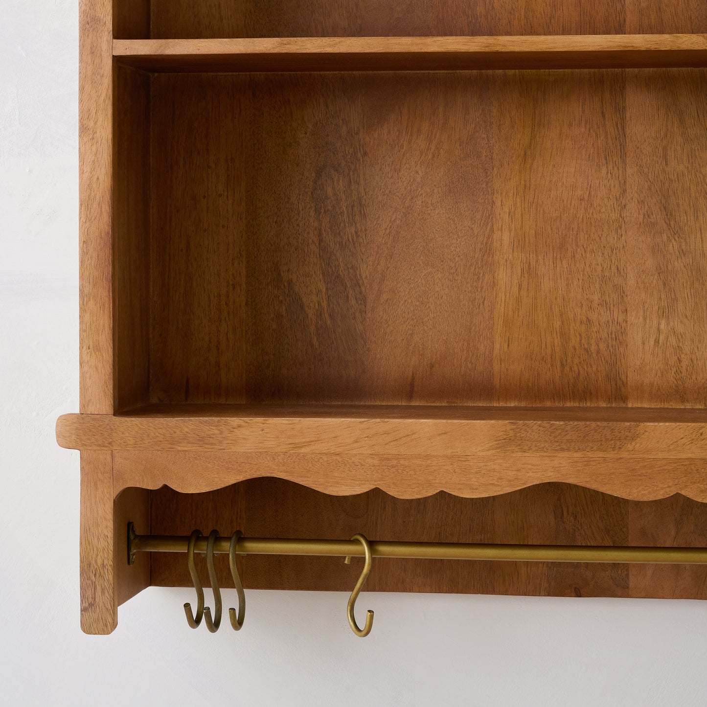 Daphne Wooden Wall Shelf close up of hooks on bottom of shelf