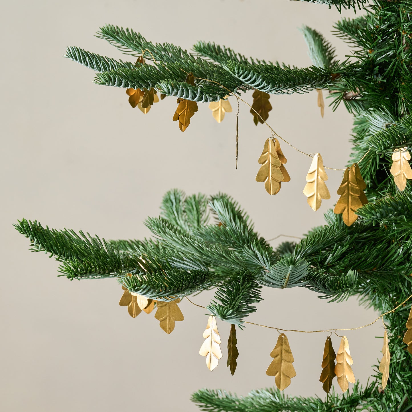 Gilded Leaf Garland shown on tree