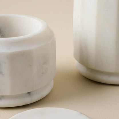 detail view of marble canister