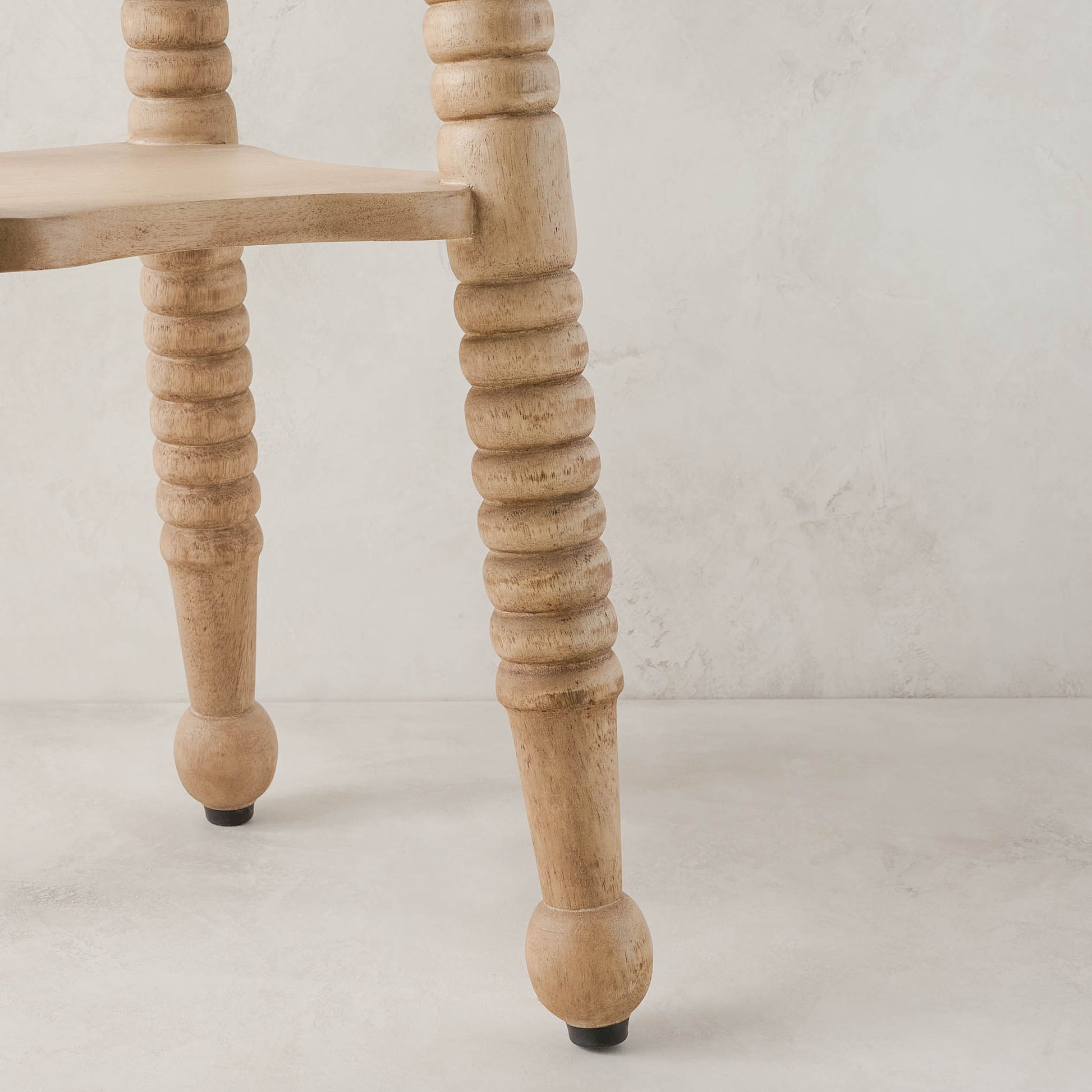 Jude Accent Table in toasted wood close up of legs