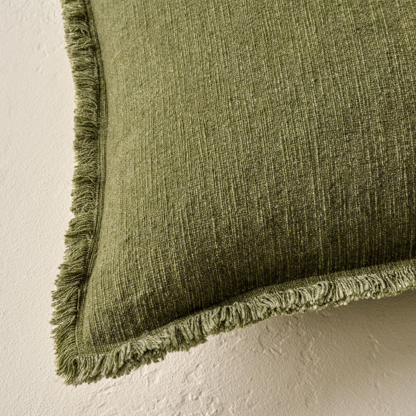 Sydney Heathered Pillow in mayfly shown up close on the corner