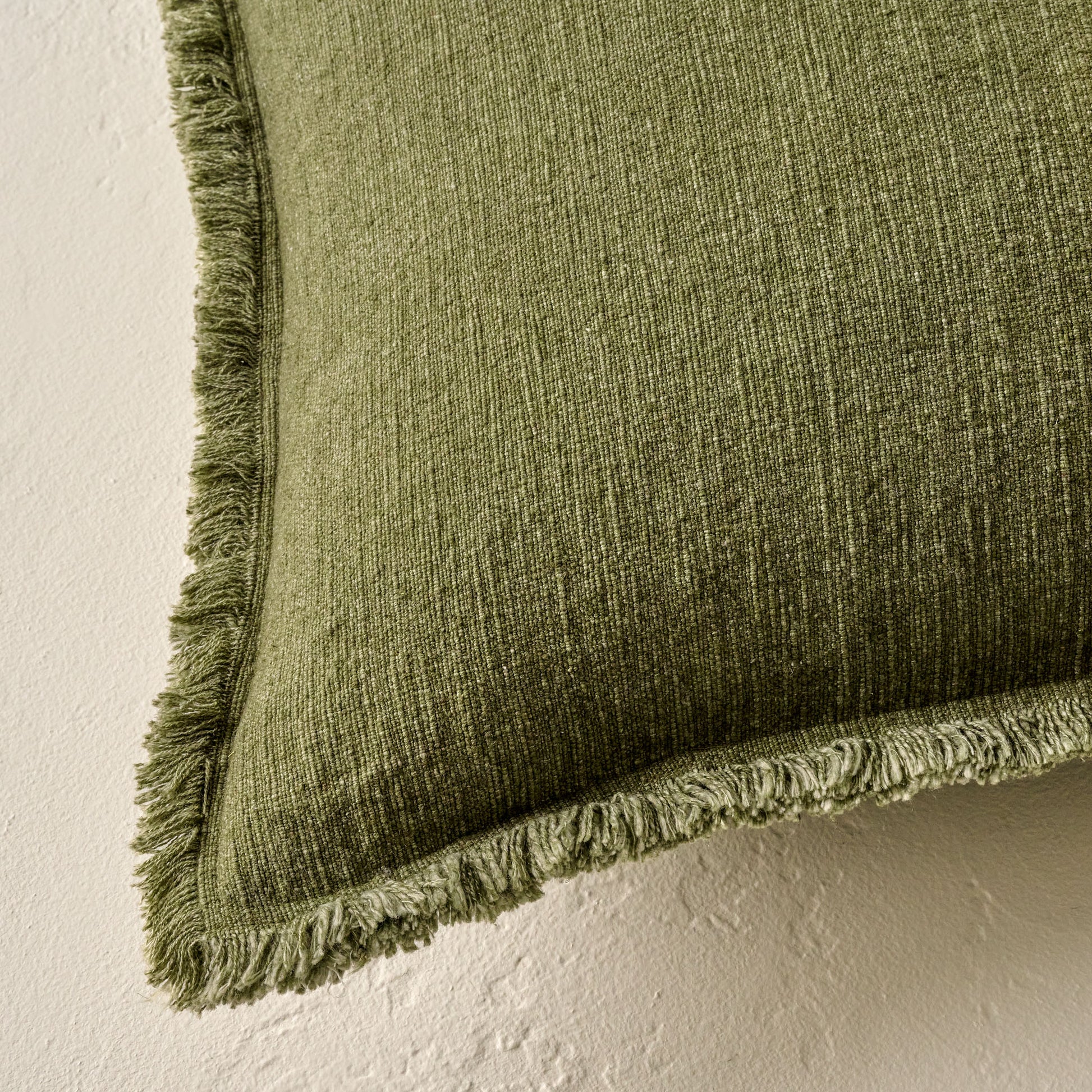 Sydney Heathered Pillow in mayfly shown up close on the corner