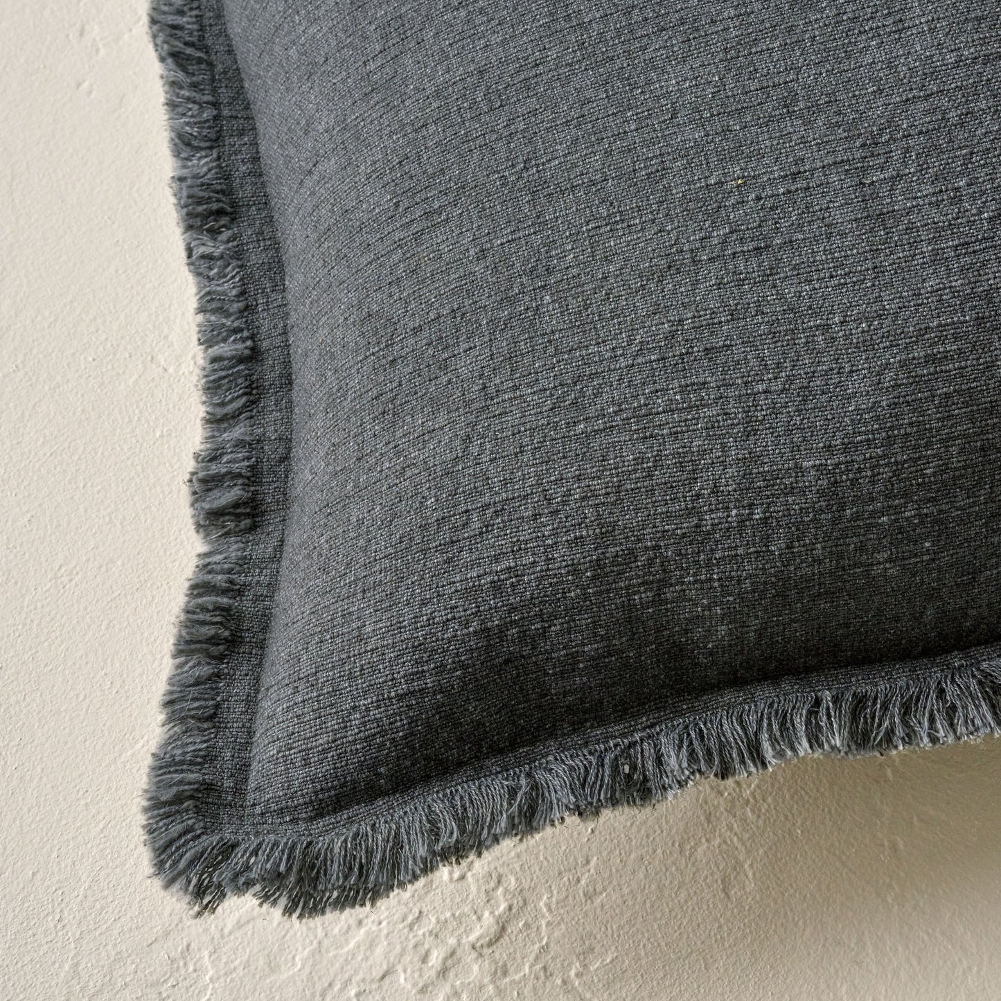 Sydney Heathered Pillow in sedona sage shown up close on the corner