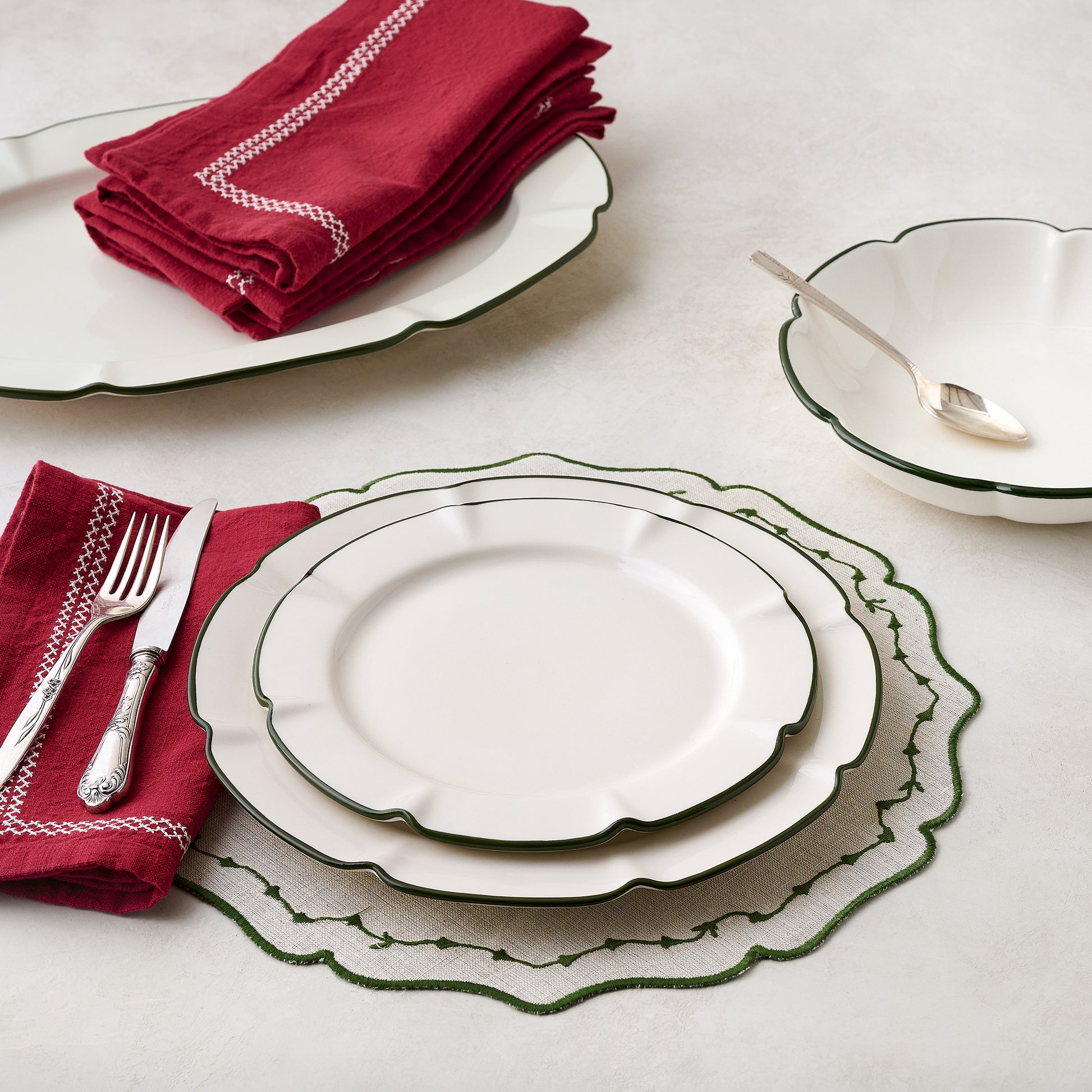 Green Luna Scalloped Serving Platter shown with other Luna collection pieces