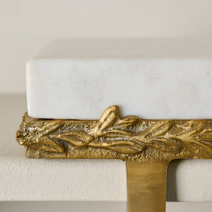 Marble and Gilded Stocking Holder shown up close