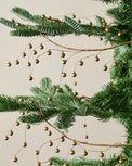 Micro Jingle Bell Garland shown on tree