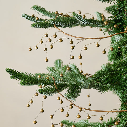 Micro Jingle Bell Garland shown on tree