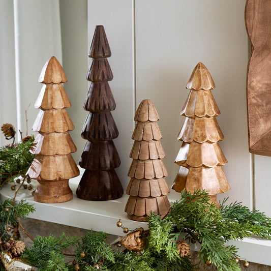 Hand Carved Woodland Trees on a mantel