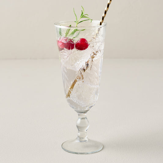 Vivian Cut Glass Stemware shown with drink and barware spoon