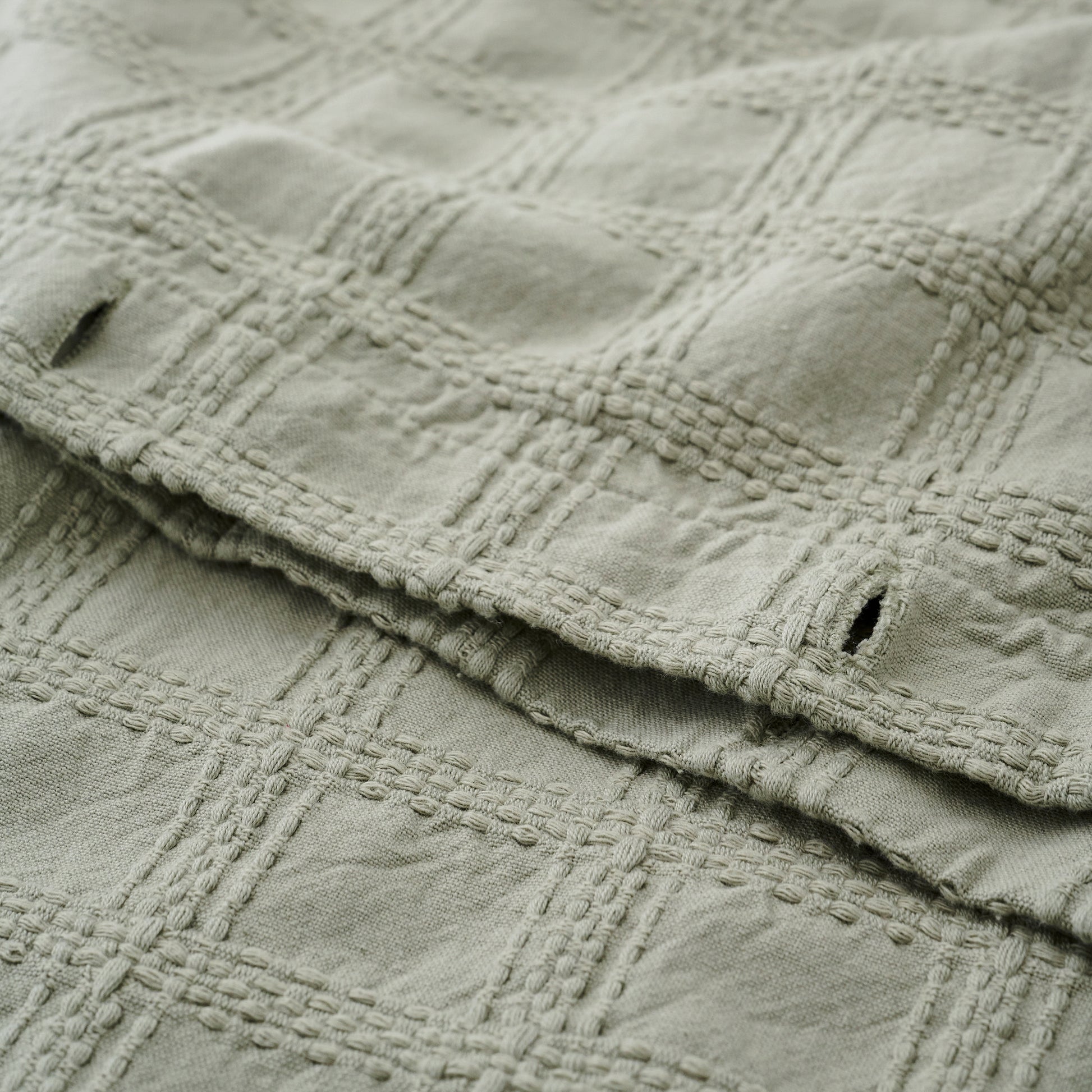 Sage Textured Shower Curtain hook holes up close