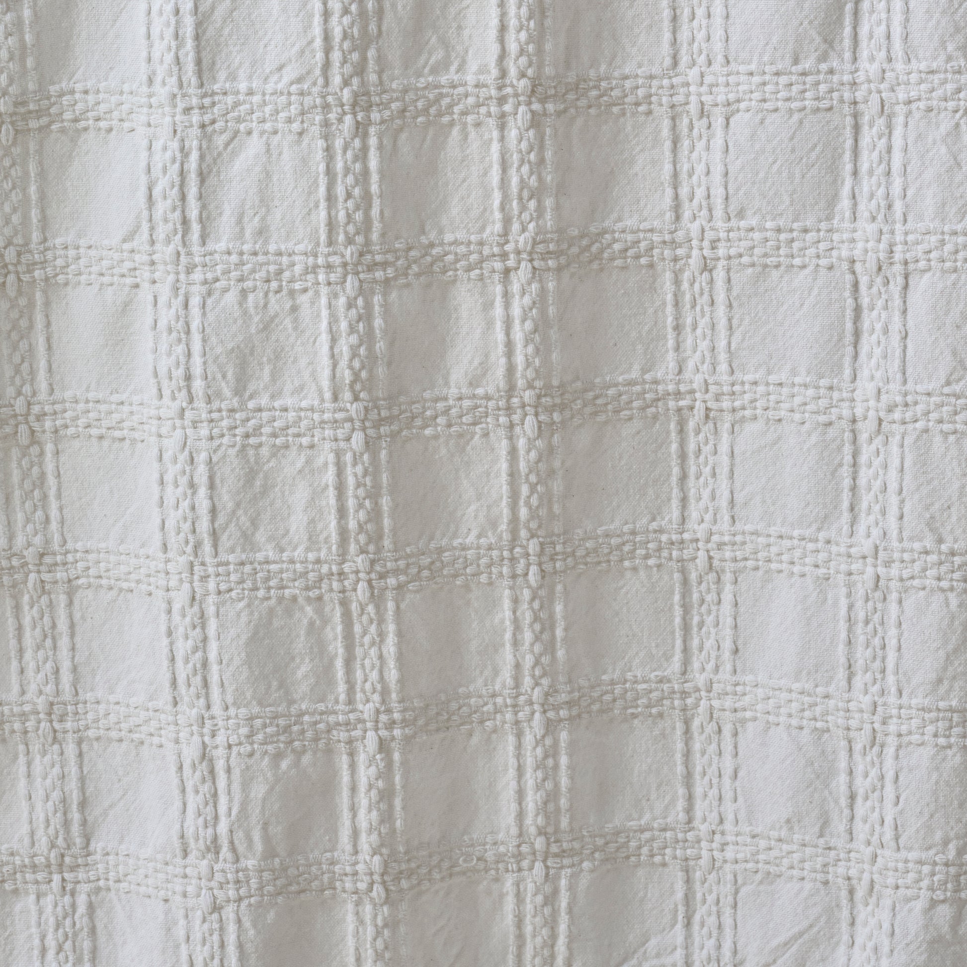 White Textured Shower Curtain material up close