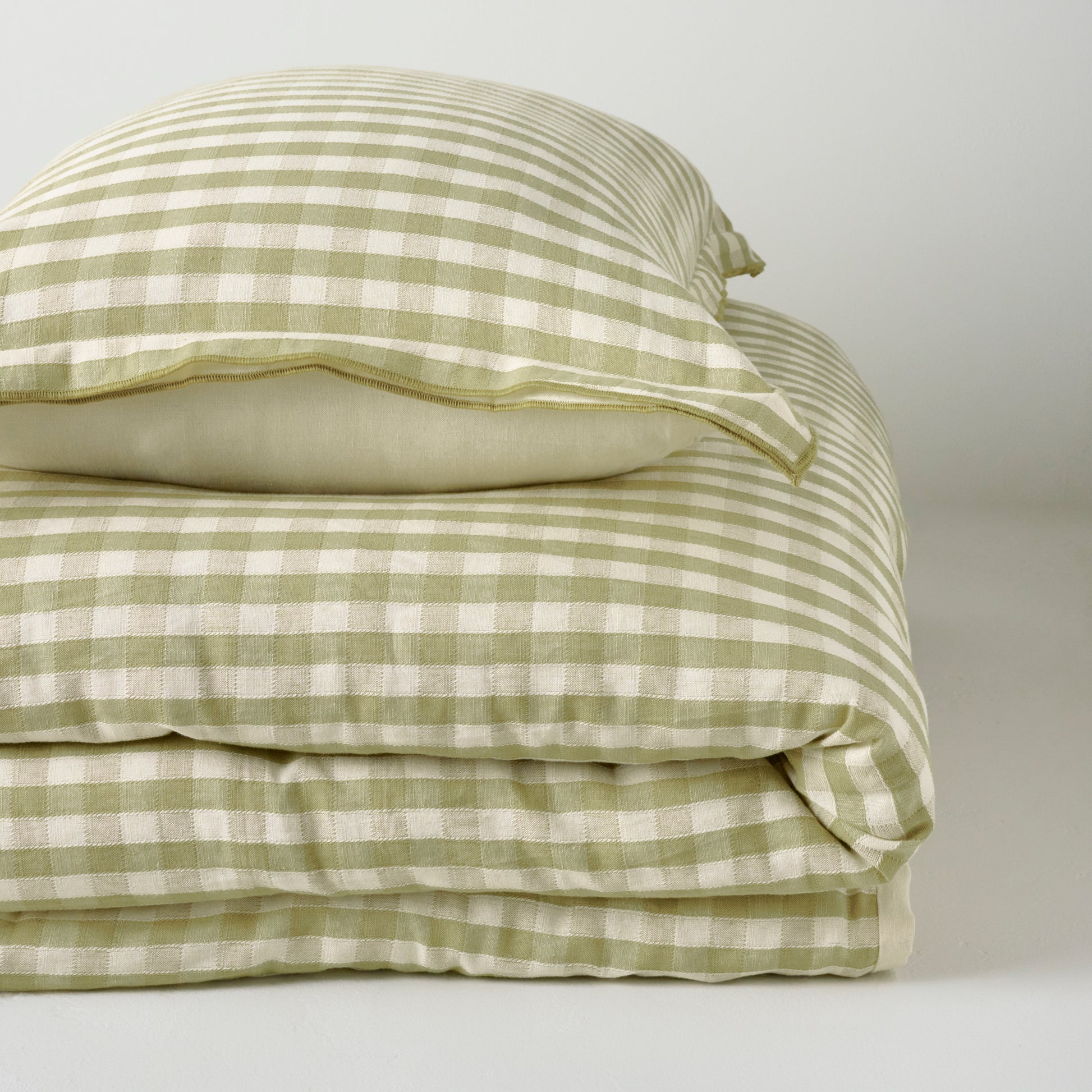 Maxine Gingham Sham shown with duvet