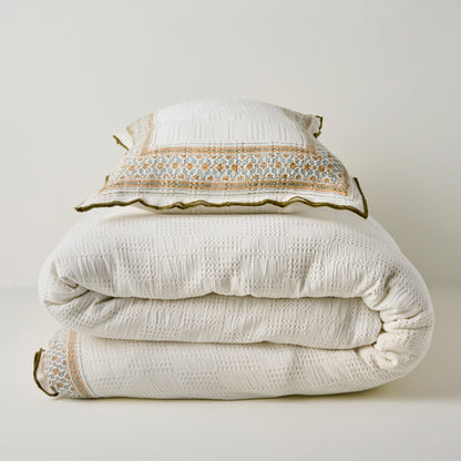 Clemence Block Print Sham shown with duvet