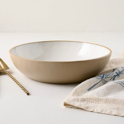 Stone White Lakelynn Serving Bowl shown with accessories