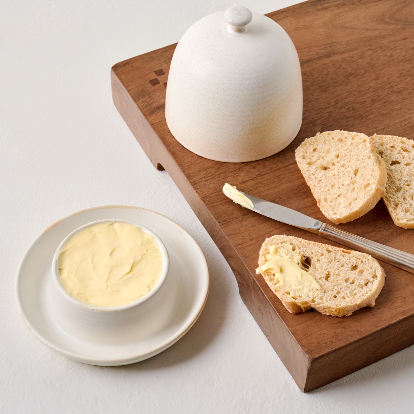 French White Butter Dish shown with butter and bread