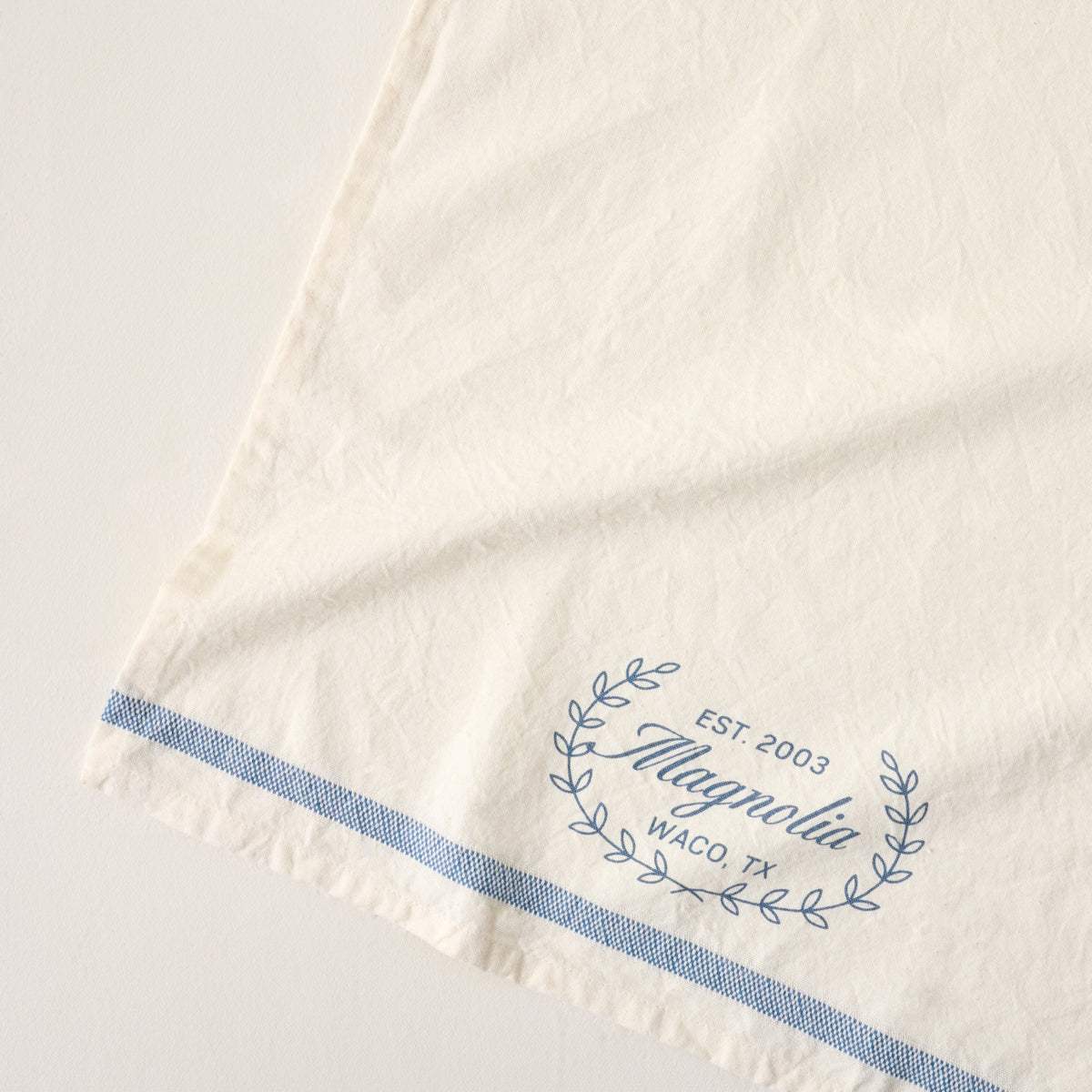 Magnolia Est. Blue Tea Towel up close
