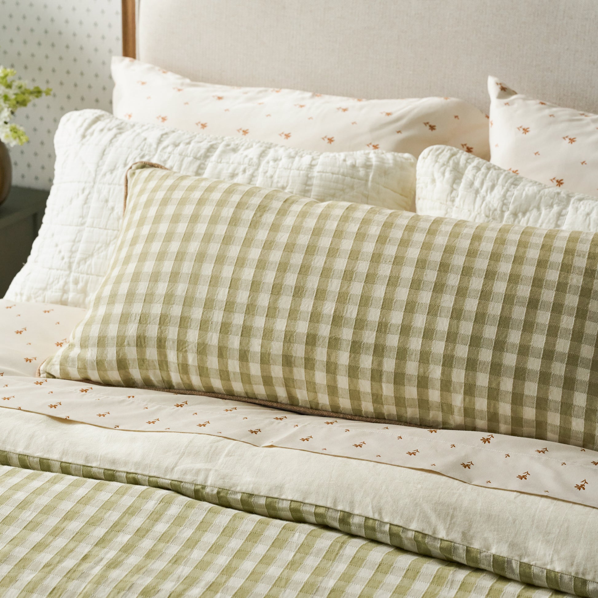 Maxine Gingham Large Lumbar Pillow on bed