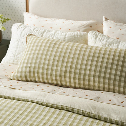 Maxine Gingham Large Lumbar Pillow on bed