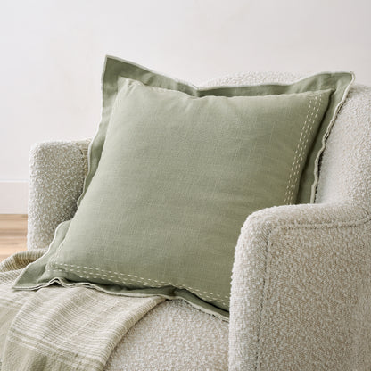 Seagrass Felix Embroidered Pillow show in chair