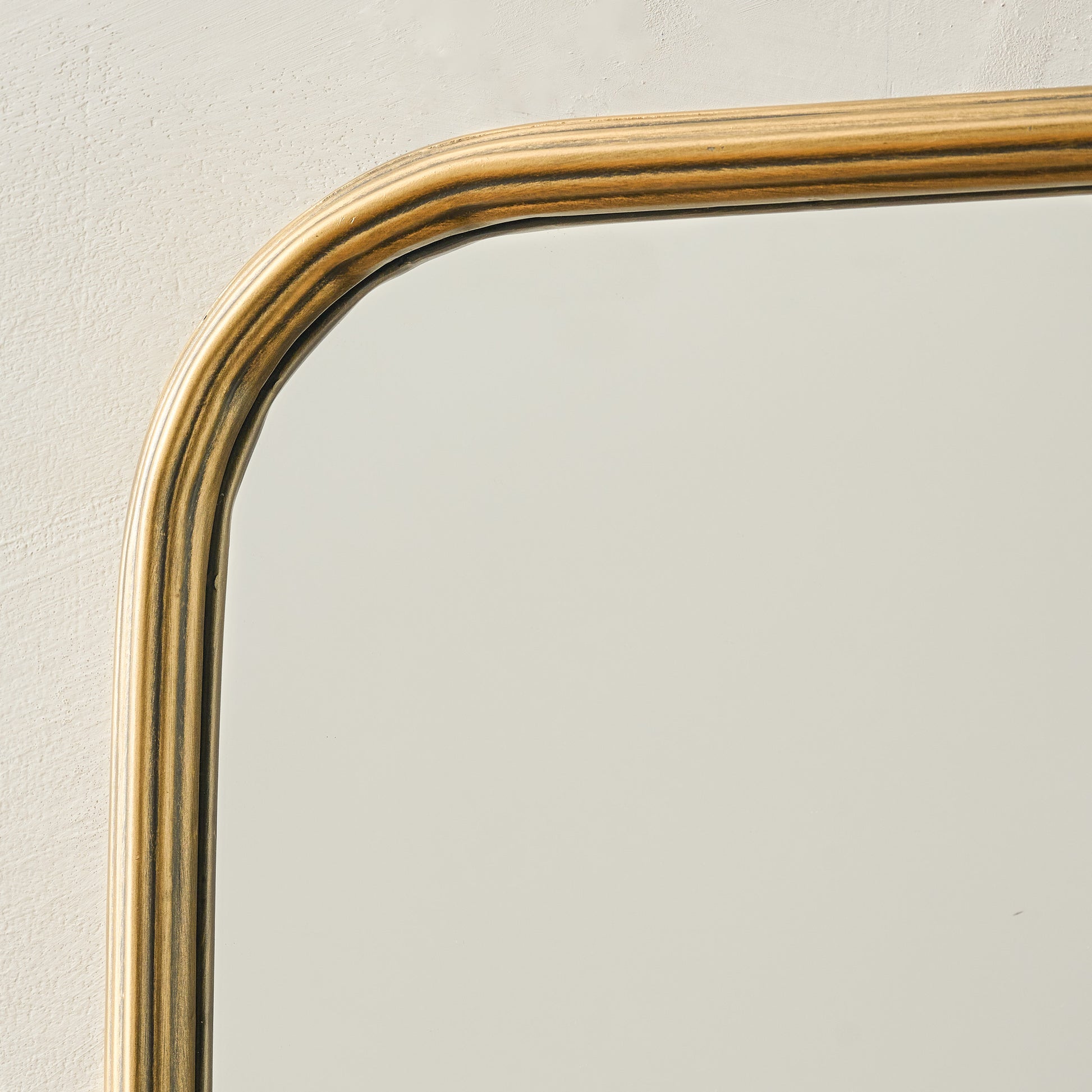 Collin Ribbed Brass Mantel Mirror frame up close