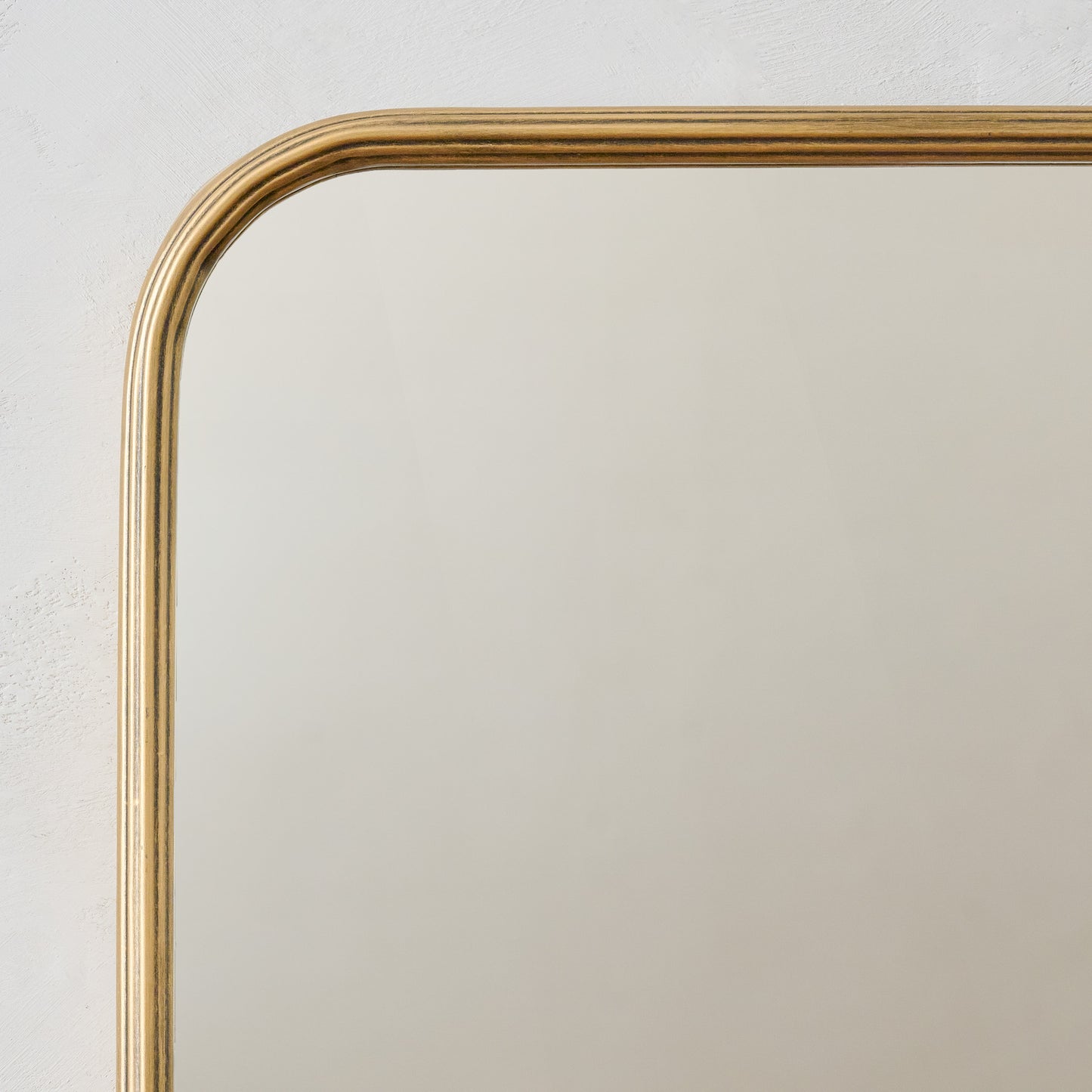 Collin Ribbed Brass Vanity Mirror frame up close