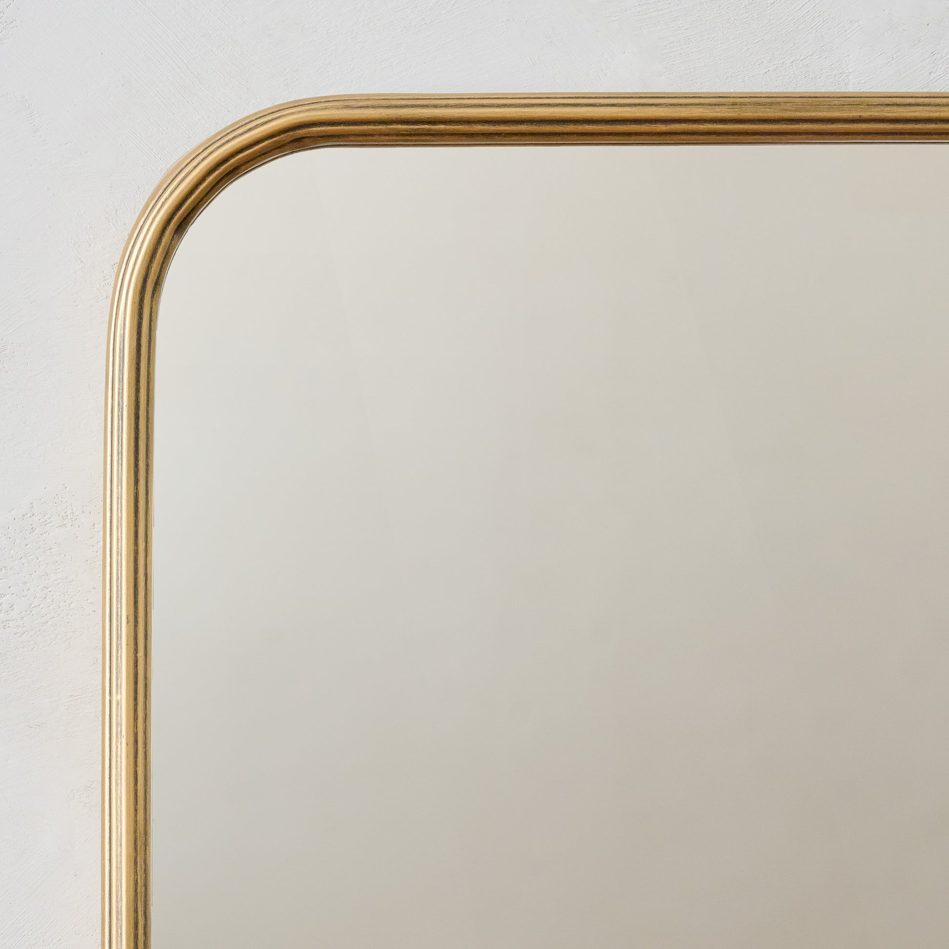 Collin Ribbed Brass Vanity Mirror frame up close
