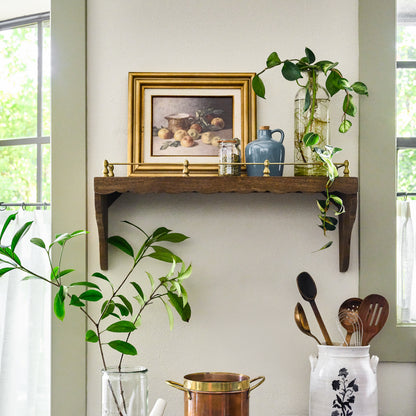 Small Quinn Wood and Brass Railing Shelf on a wall