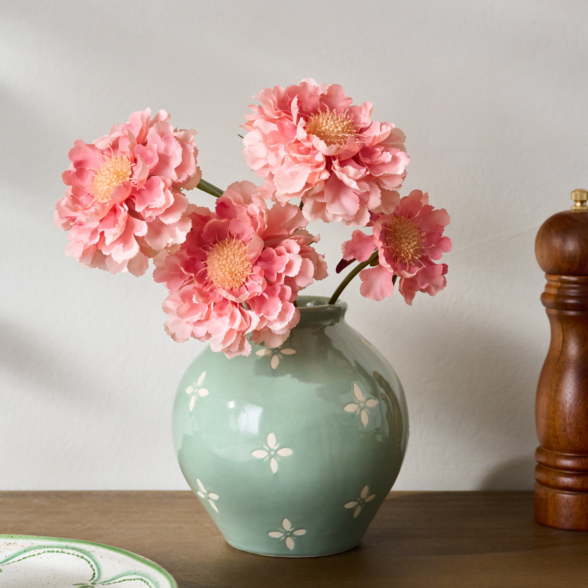 Green and White Luna Bud Vase shown with flowers
