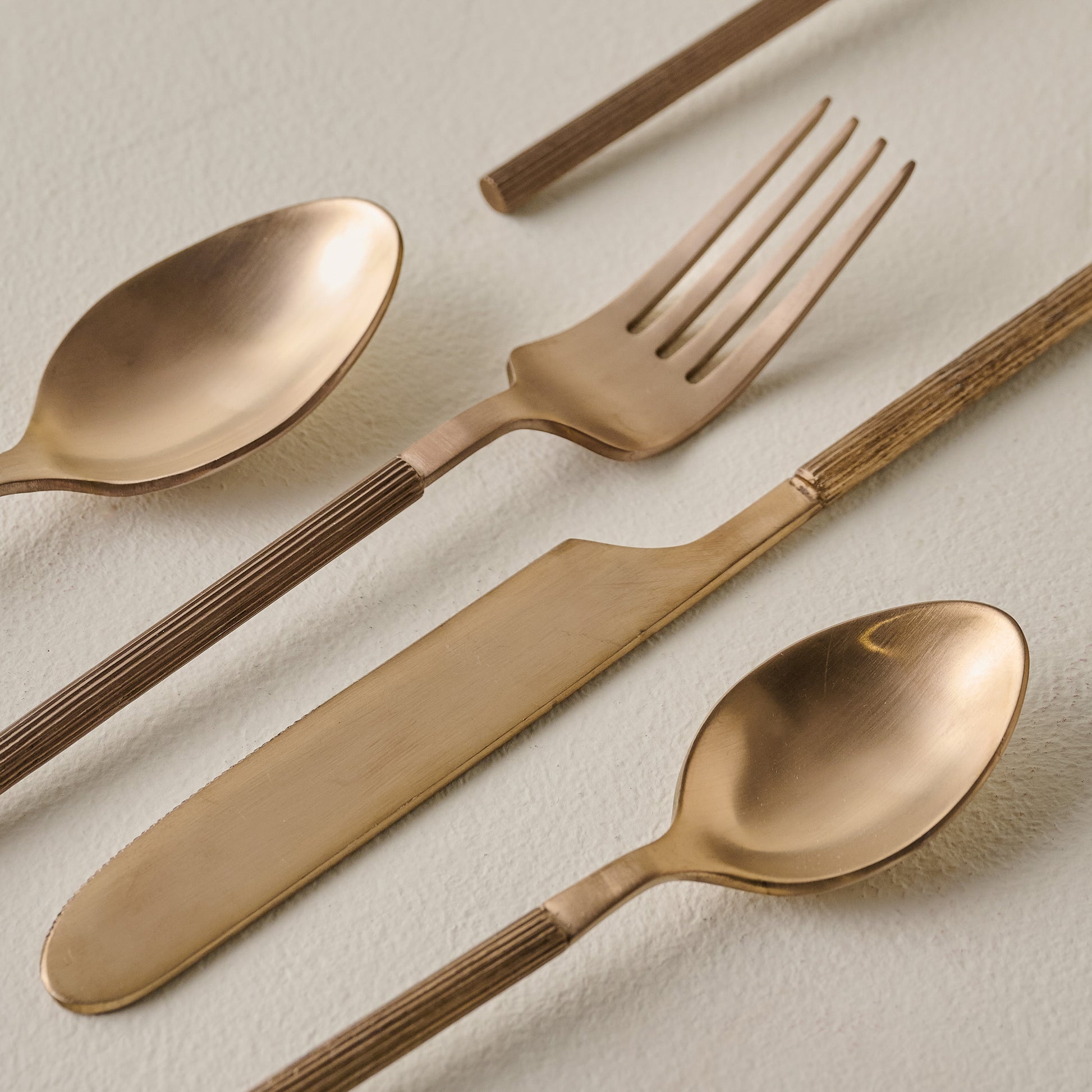 Antique Copper Ribbed Flatware Set of Five up close