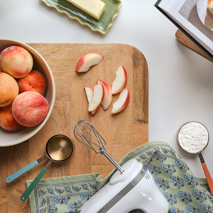 Evie Copper Measuring Cups shown on kitchen counter