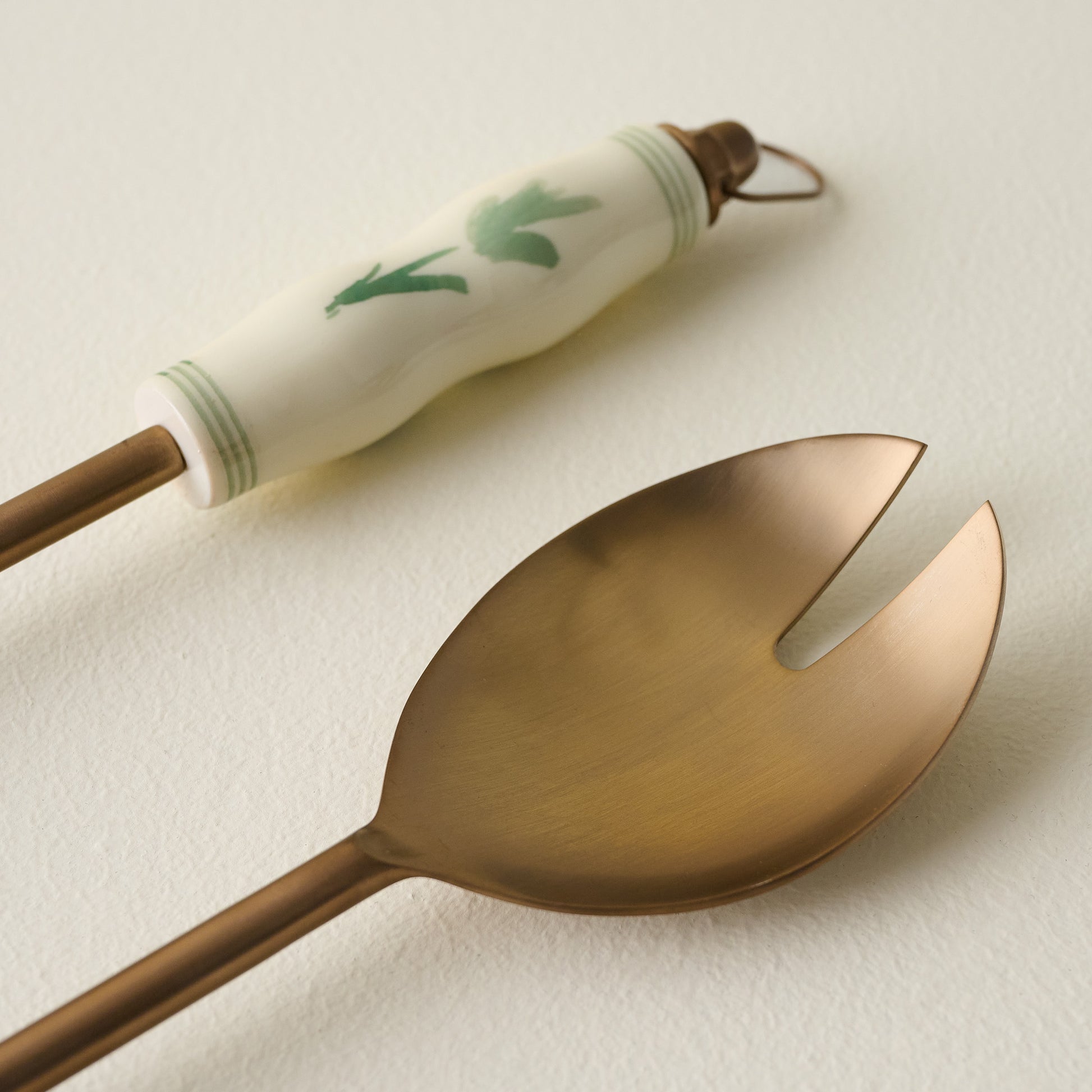 Copper Floral Serving Utensil Set up close