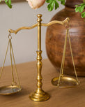 Solid Brass Bookshelf Scale shown on table