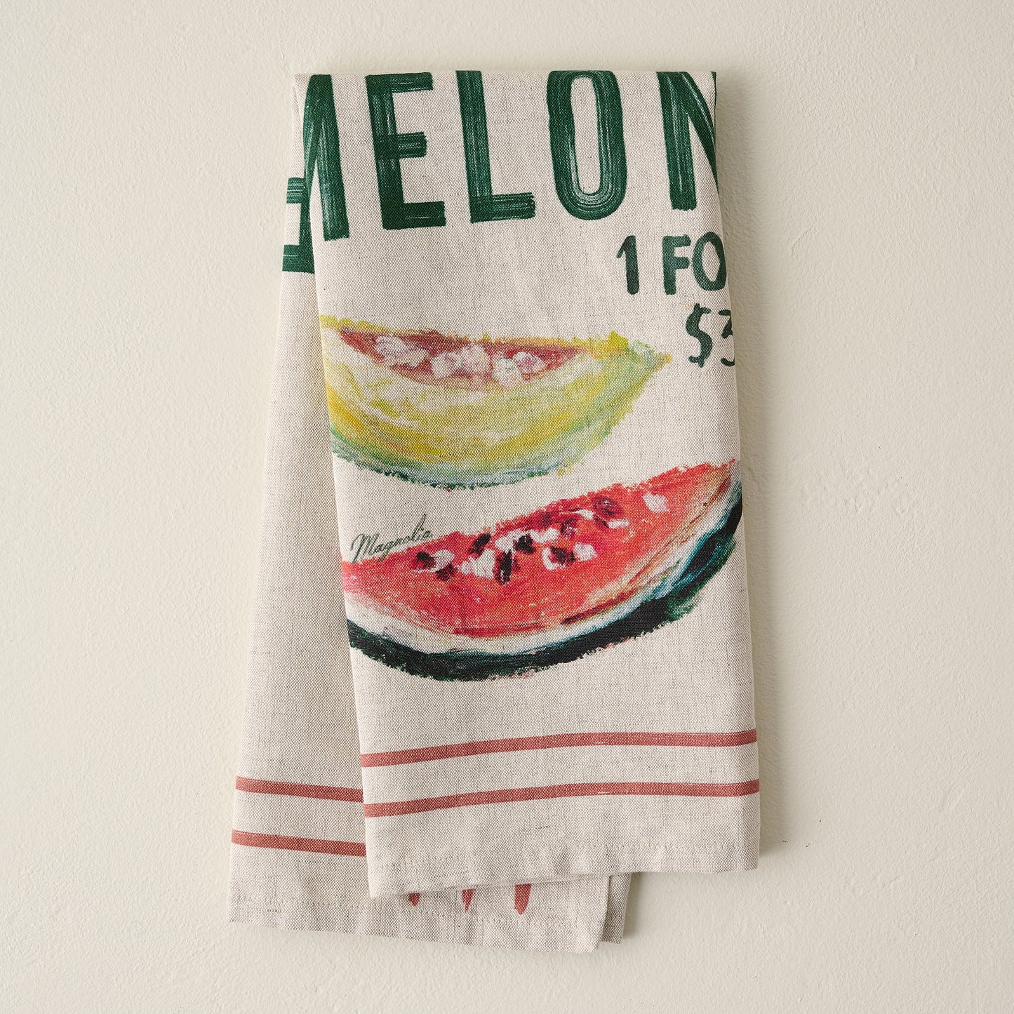 Magnolia Fresh Melon Tea Towel shown folded