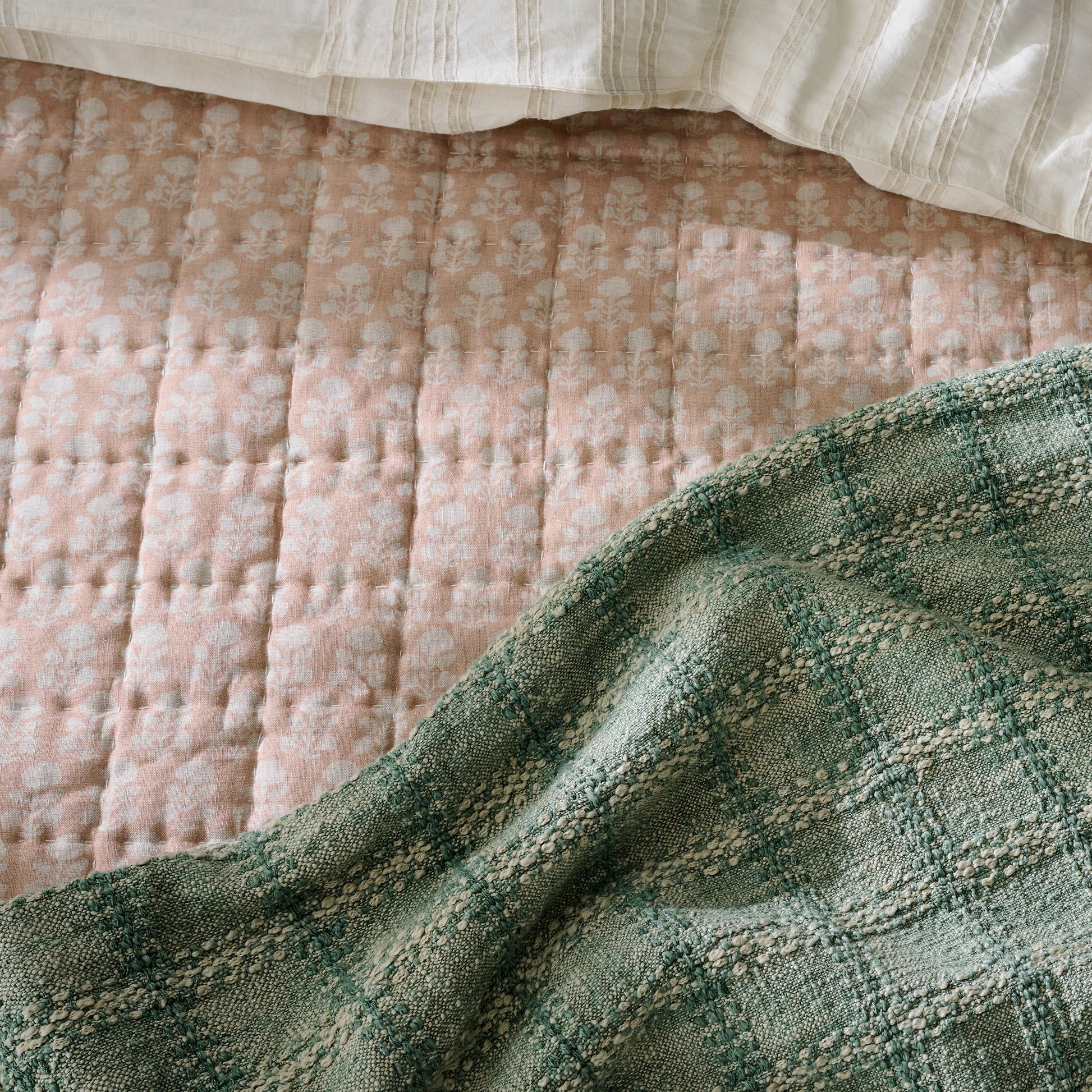 Woven Grid Coverlet - Seaspray up close shown on bed