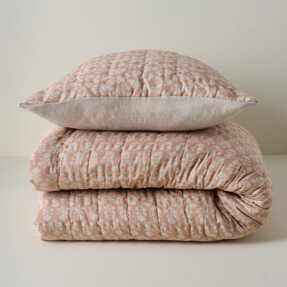 Ellie Block Print Quilt shown stacked with coordinating sham